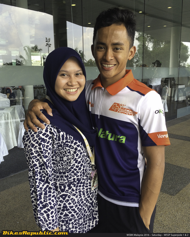 Fahmi and his wife in the circuit paddock earlier today.